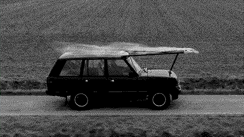 photographie d'un homme debout au milieu d'une rue de Tokyo.