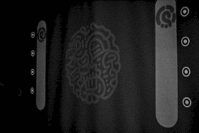 sur fond noir sont projetées des formes géométriques colorées et interactives.