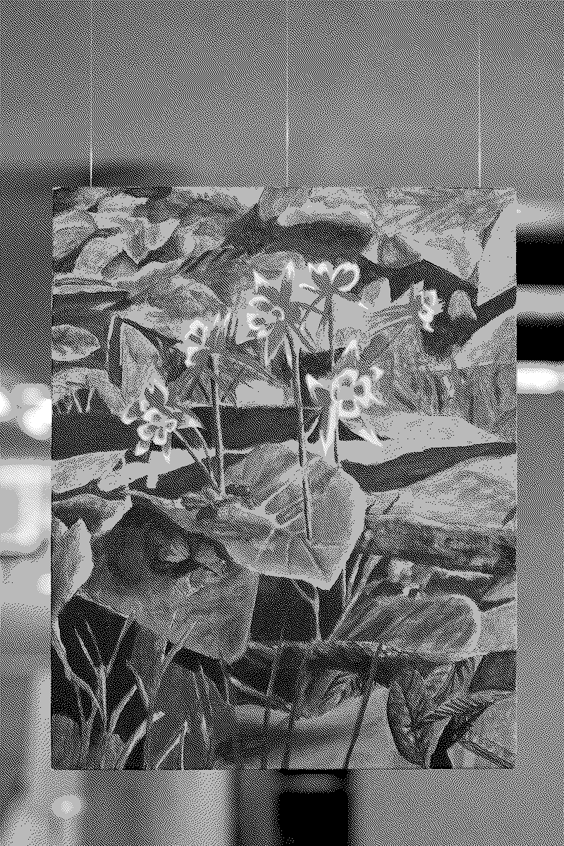 peinture de fleur suspendue, elle représente une fleur glitchée rouge de jeu vidéo