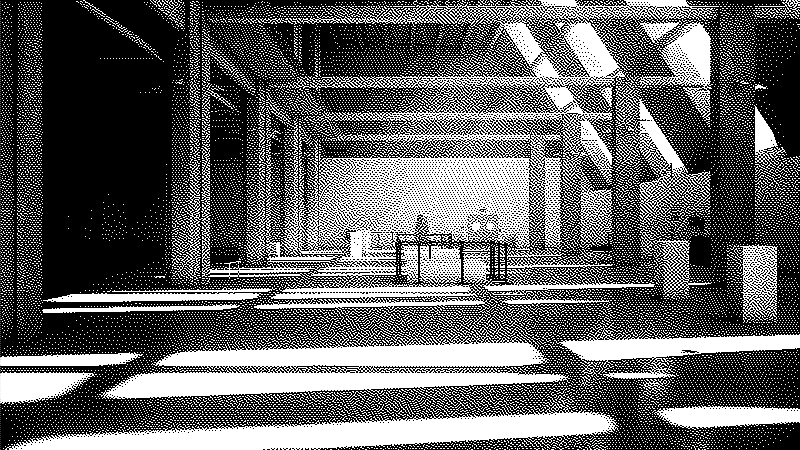 grande salle vide ressemblant à un hangar, des objets trainent au sol, au fond une sculpture emballée sur un socle